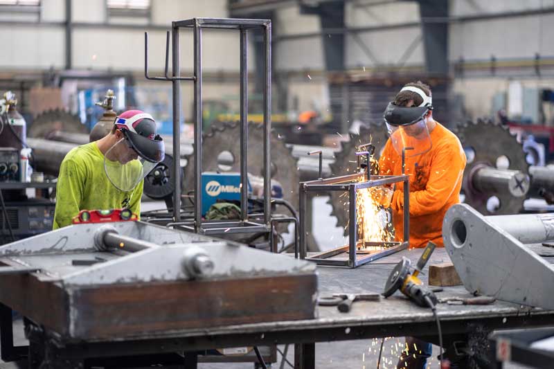 H&H employee working on cutting metal